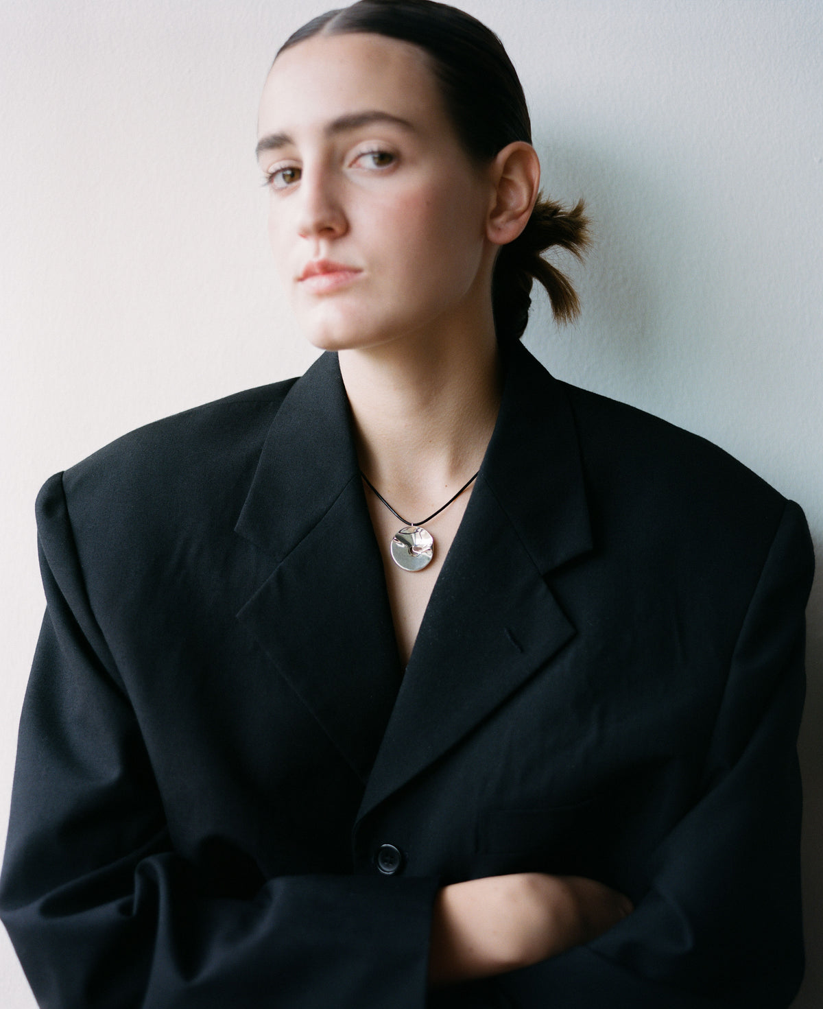 model, campaign, valley of the moon necklace, jewellery, statement necklace, sculptural jewellery, minimal jewellery, S925, sterling silver, rhodium plated, adjustable cord, front view