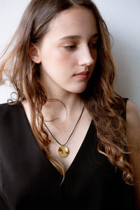 model, campaign, valley of the moon necklace, jewellery, statement necklace, sculptural jewellery, minimal jewellery, gold vermeil, 18k gold vermeil, adjustable cord, front view