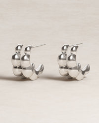 double petal studs, frontal view, model, jewellery, product shot, sterling silver, S925, sculptural jewellery