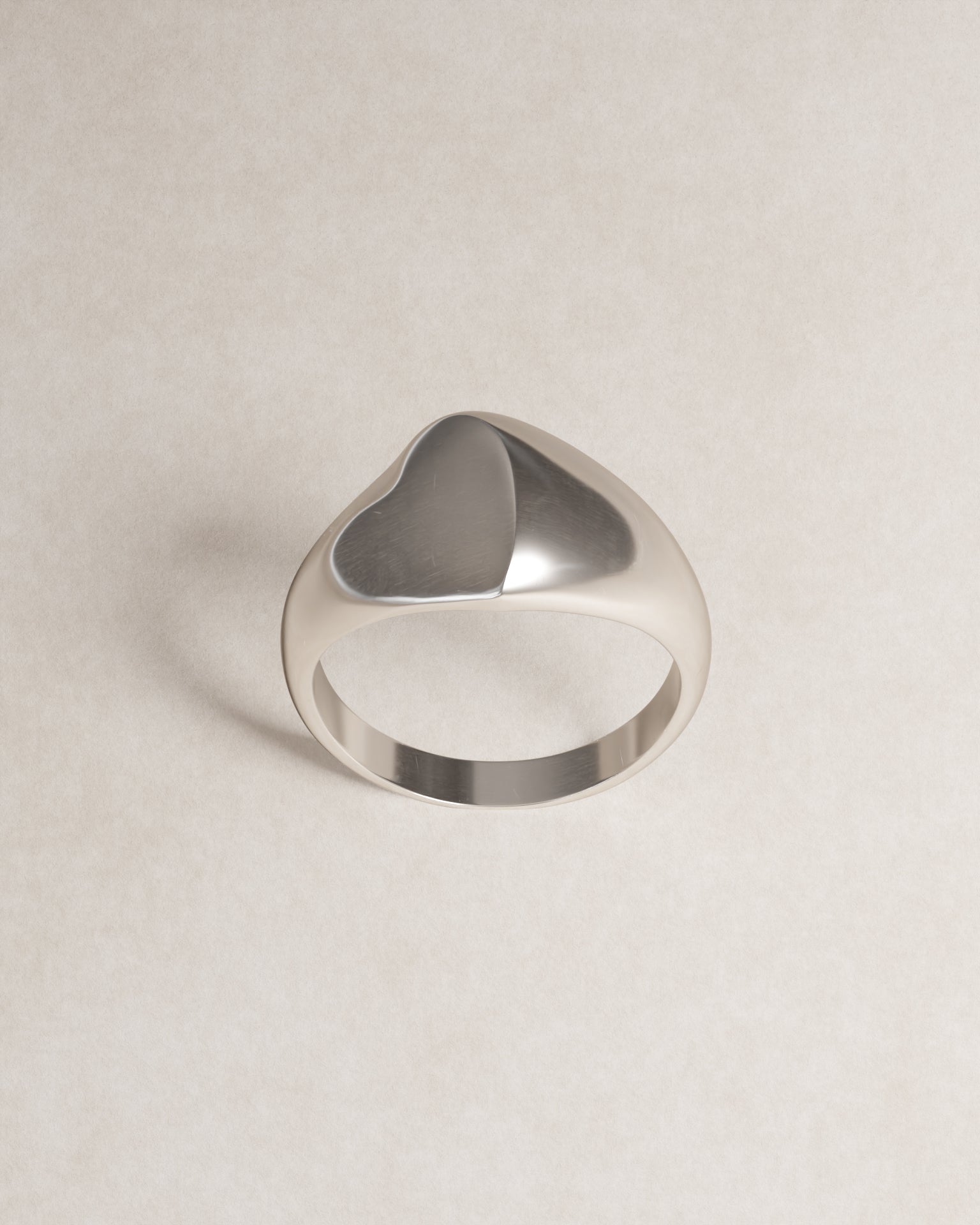 heart signet ring, S925, sterling silver, rhodium plated, twisted, imperfect, jewellery, minimal jewellery, sculptural jewellery, valentine, heart, product shot, front view