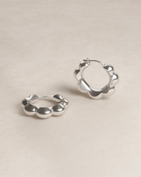 petal hoops, geometry, geometric, flower, petals, S925, sterling silver, rhodium plated, jewellery, minimal jewellery, sculptural jewellery, product shot, close up, front view