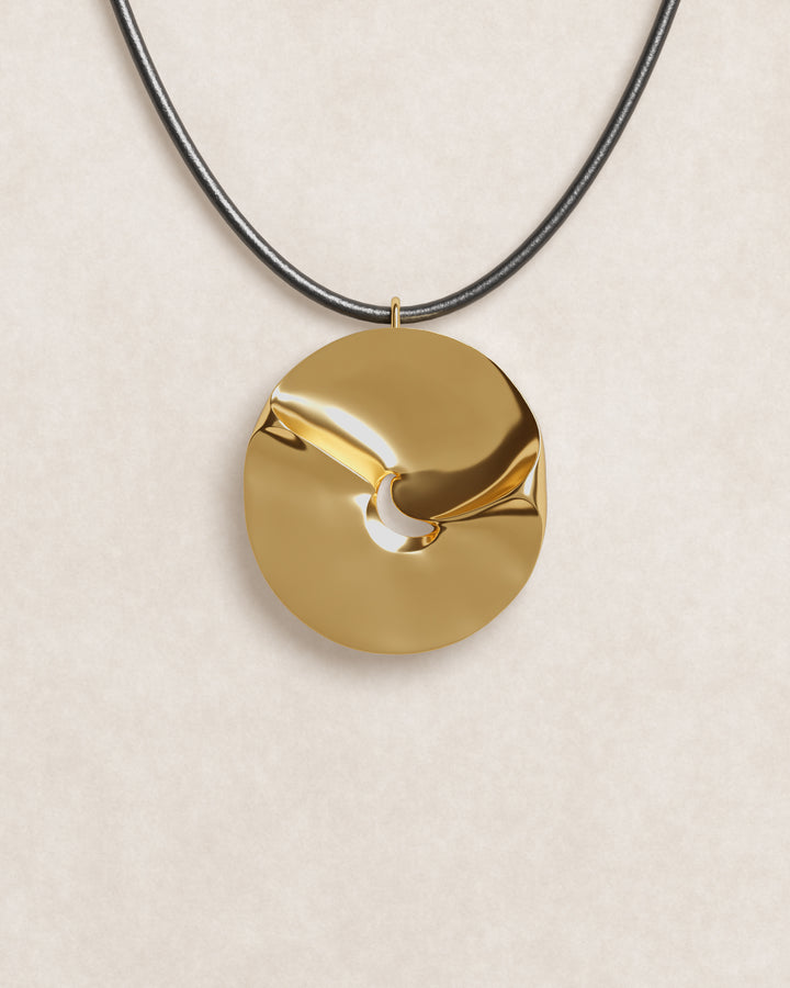 close up, product shot, valley of the moon necklace, jewellery, statement necklace, sculptural jewellery, minimal jewellery, gold vermeil, 18k gold vermeil, adjustable cord, front view