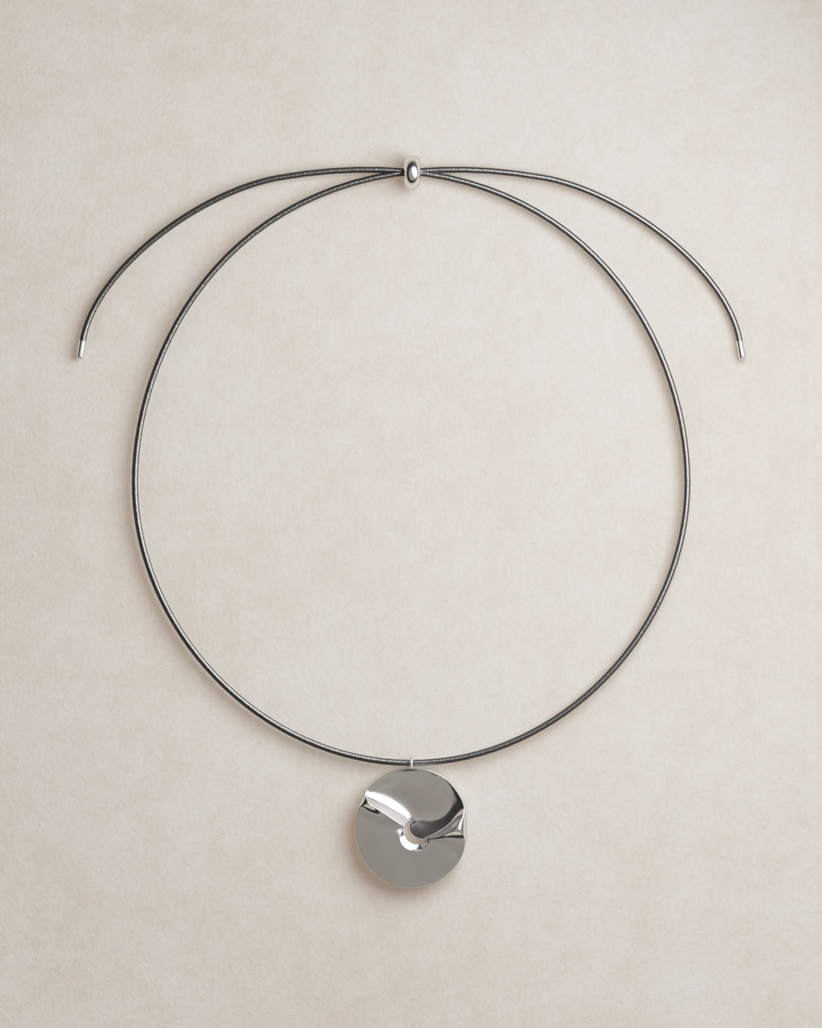 product shot, valley of the moon necklace, jewellery, statement necklace, sculptural jewellery, minimal jewellery, S925, sterling silver, rhodium plated, adjustable cord, front view